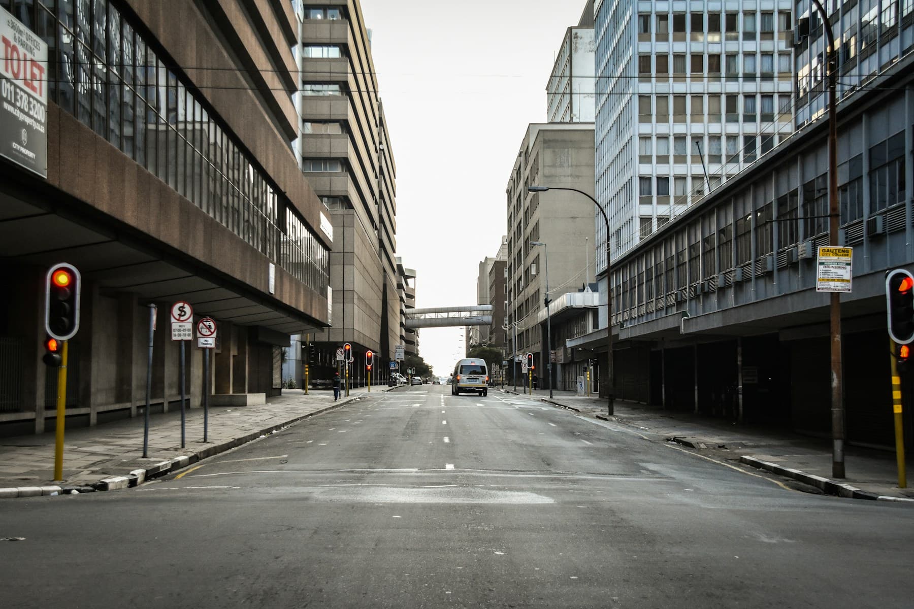 Johannesburg city street with traffic lights and vehicles